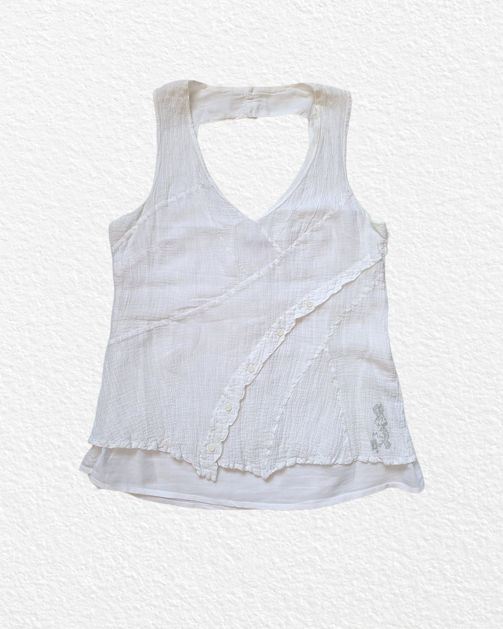 White cotton gauze top with open back and diagonal button trim — L