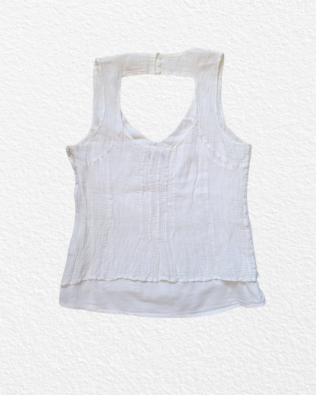 White cotton gauze top with open back and diagonal button trim — L